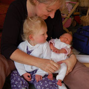 Baby Matilda at 1 week old with big sister Isabella